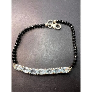 Black spinel and blue topaz bracelet with sterling lobster clasp